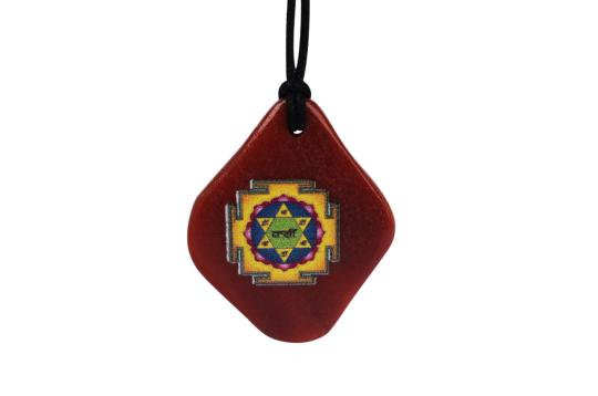 Kamdev Yantra Pendant on Orange Jade